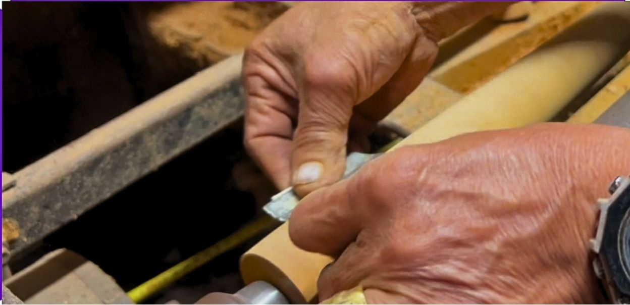 Filipino artisan assembling furniture for export